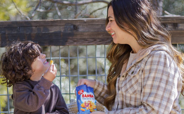 Micro Mom Influencer posting products with her son.