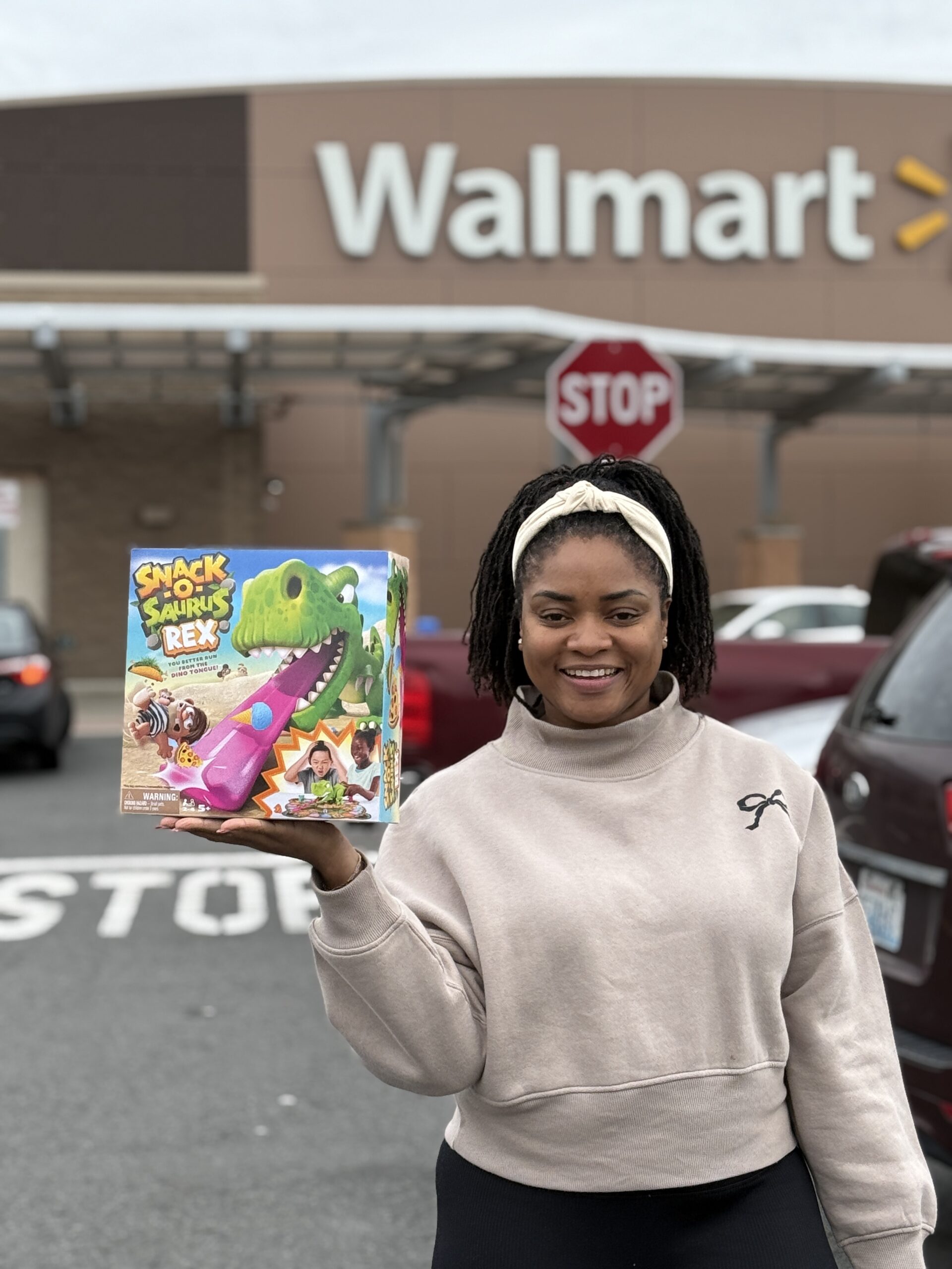 mom influencer showcasing Walmart purchases outside the store for a social media partnership.