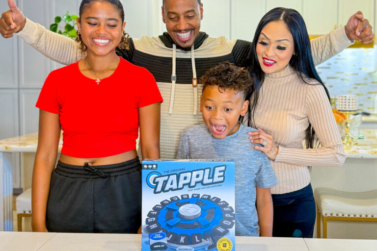 Gen Z parents and kids reacting excitedly to a family word game at home, illustrating authentic family moments and real-life product engagement for marketing to modern parents.